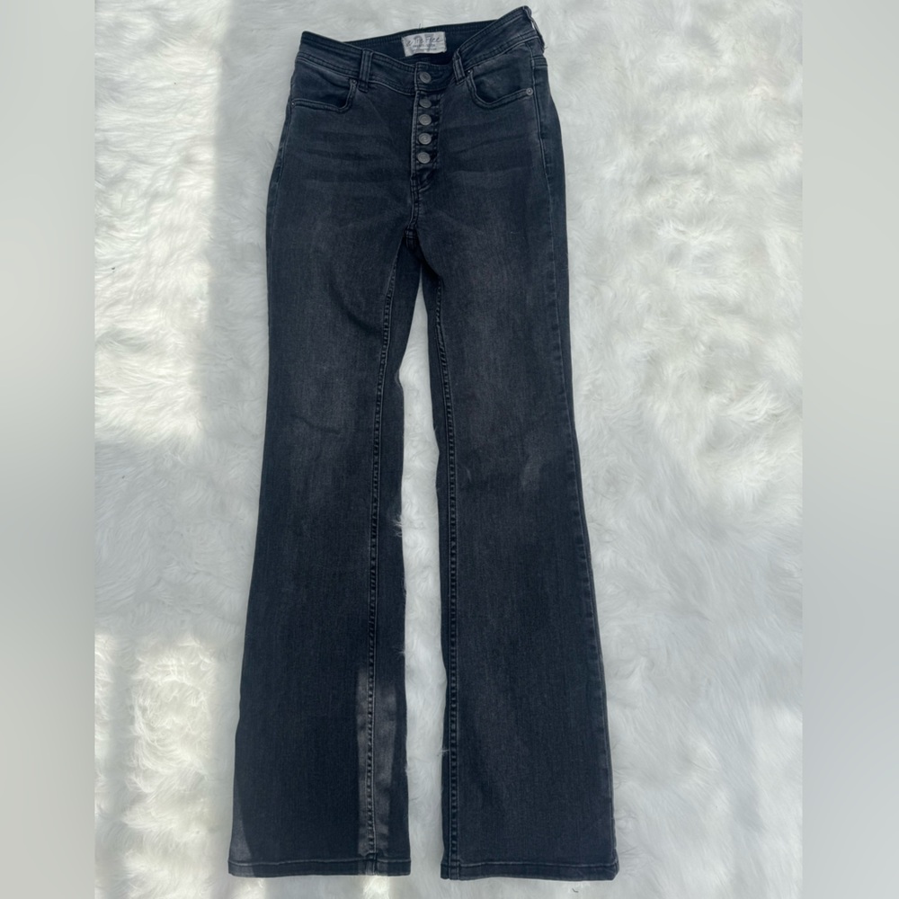 Dark wash jeans by We The Free.  Size 27.